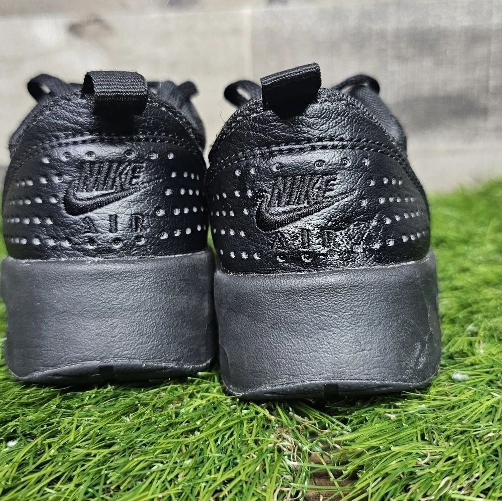 NIKE AIR MAX TAVAS TRIPLE BLACK TRAINERS
